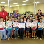 Carlos Gonzales’ first grade class from Rangerville Elementary is seen Monday at the San Benito News office, where students were treated to a tour of the facility and learned about the publication’s operations. (Staff photo by Michael Rodriguez)